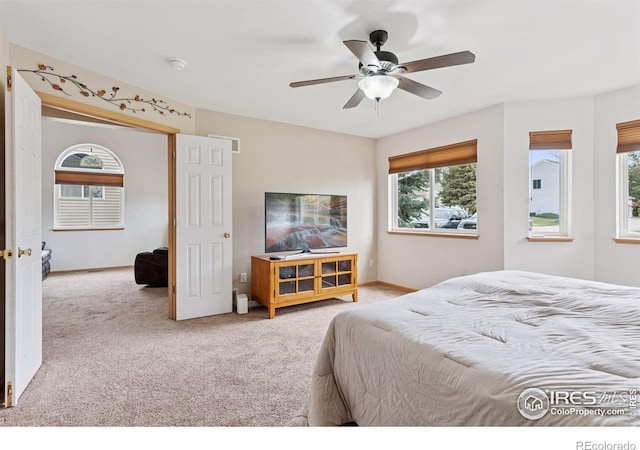 2143 Meadow Ct, Longmont, CO 80501 - carpeted bedroom with baseboards and ceiling fan