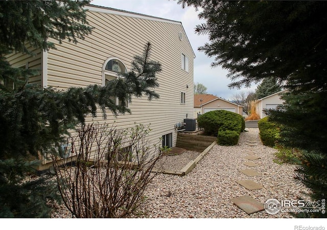 2143 Meadow Ct, Longmont, CO 80501 - view of side of property with central AC unit