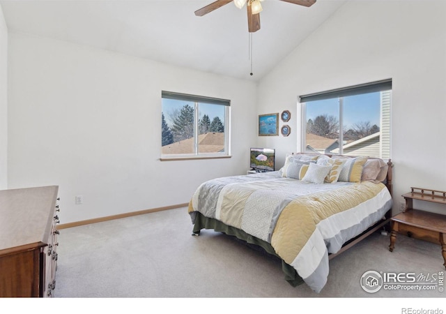 2143 Meadow Ct, Longmont, CO 80501 - carpeted bedroom with baseboards, a ceiling fan, and high vaulted ceiling