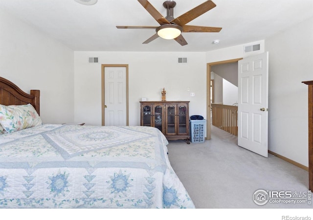 2143 Meadow Ct, Longmont, CO 80501 - bedroom with light colored carpet and ceiling fan