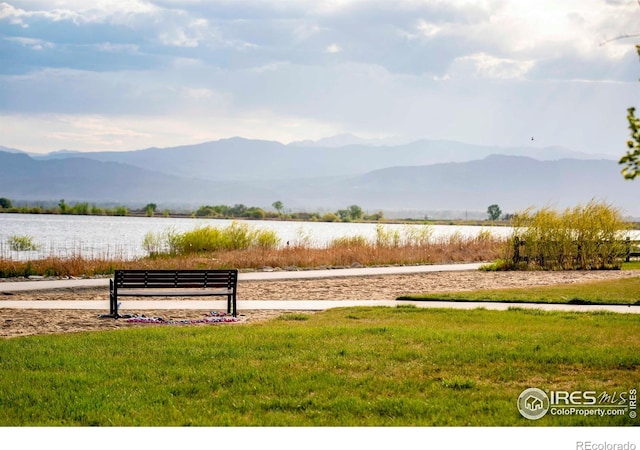 7086 Thunderview Dr, Timnath, CO 80547 - view of mountain background with a nearby body of water