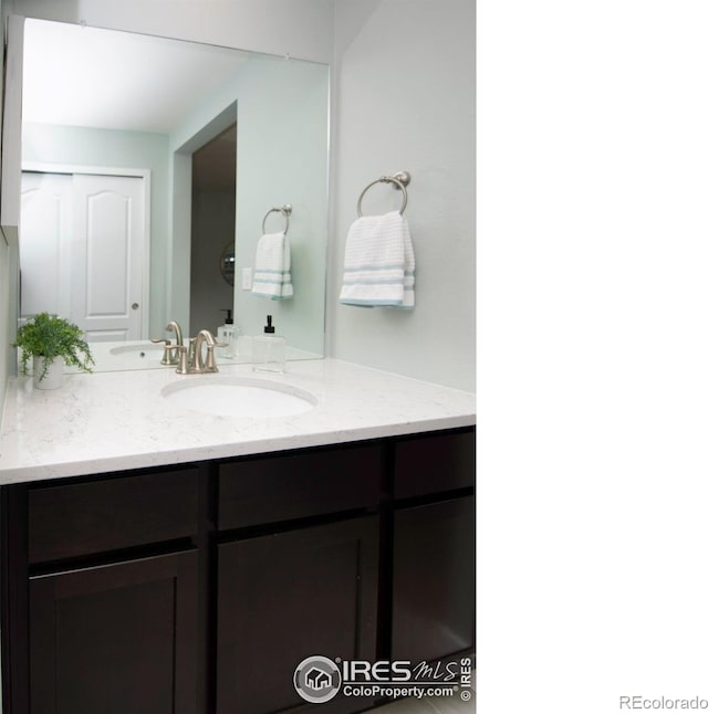 7086 Thunderview Dr, Timnath, CO 80547 - bathroom with vanity