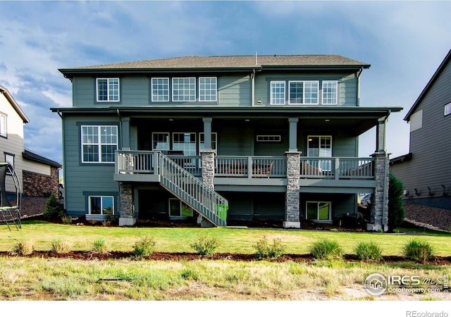 7086 Thunderview Dr, Timnath, CO 80547 - view of front of home featuring stairs and a front yard