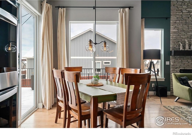 dining area with wood finished floors and a wealth of natural light