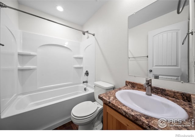 full bath featuring shower / washtub combination, recessed lighting, vanity, and toilet