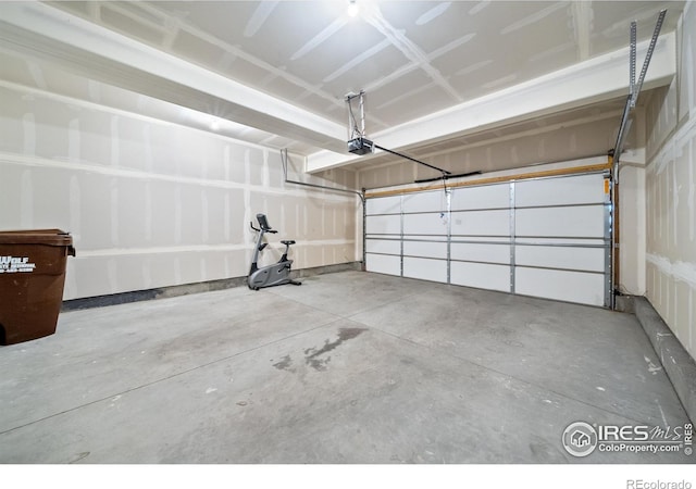 garage featuring a garage door opener