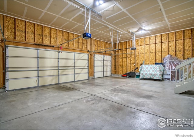 garage featuring a garage door opener