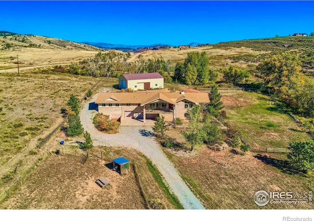 aerial view with a rural view and a mountain view