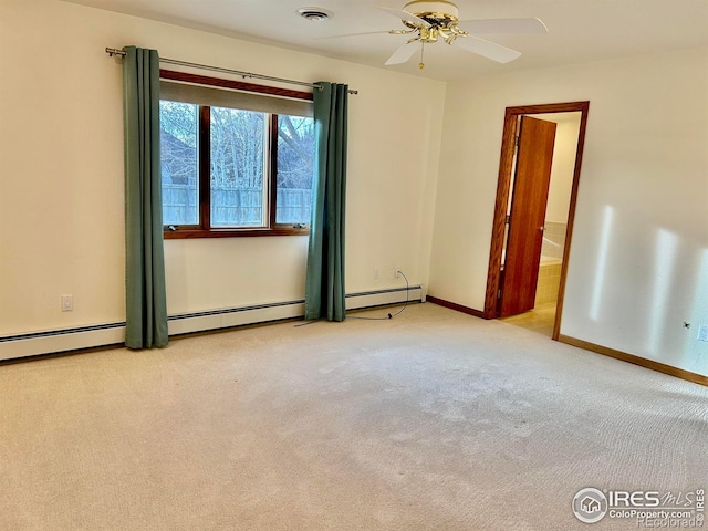 spare room with light carpet, baseboards, visible vents, and ceiling fan