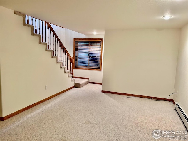 stairs with carpet, baseboards, and baseboard heating