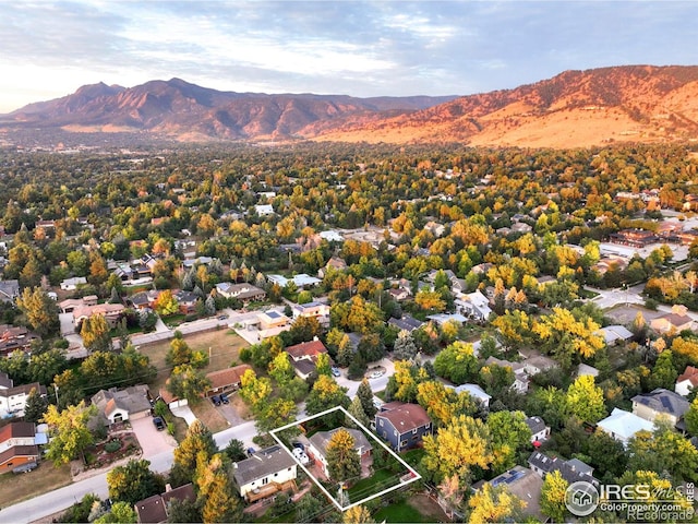 drone / aerial view with a residential view and a mountain view