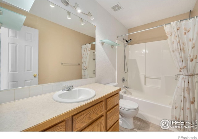 full bathroom with toilet, shower / tub combo, vanity, visible vents, and tile patterned floors