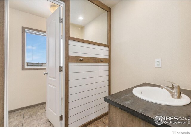 bathroom with vanity and tile patterned floors