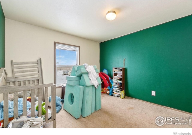 bedroom featuring light colored carpet