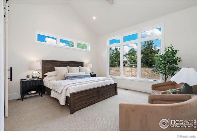 6398 Foundry Ct, Timnath, CO 80547 - bedroom with high vaulted ceiling, light colored carpet, baseboards, and recessed lighting