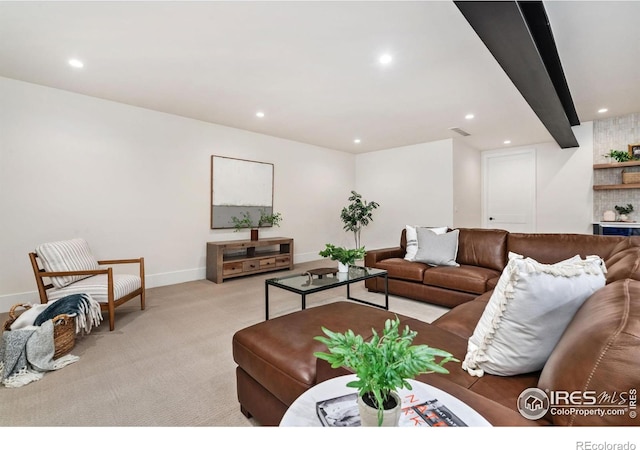 6398 Foundry Ct, Timnath, CO 80547 - living room featuring light carpet, recessed lighting, baseboards, and a bar