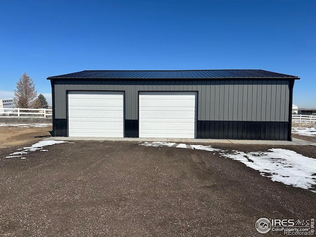 detached garage with fence