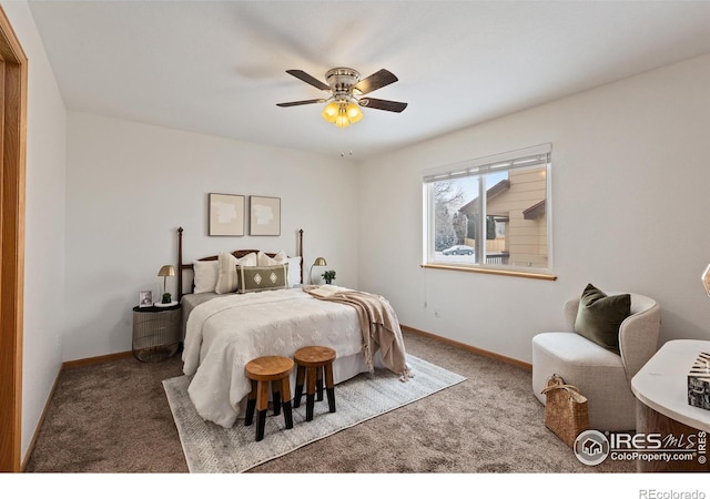 carpeted bedroom with a ceiling fan and baseboards