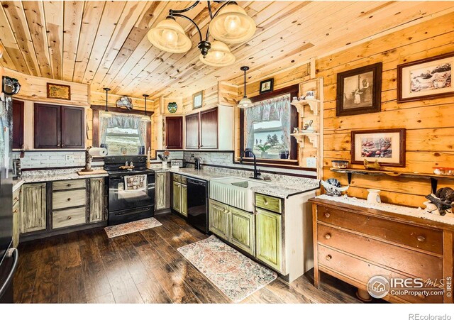 kitchen with black appliances, a wealth of natural light, a sink, and decorative light fixtures