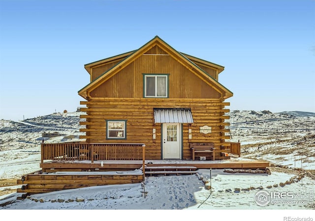 log-style house featuring log exterior