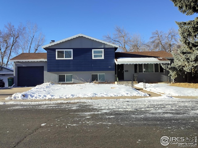 split level home with an attached garage