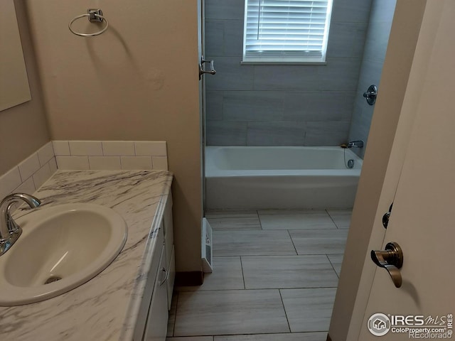 bathroom with shower / bath combination and vanity