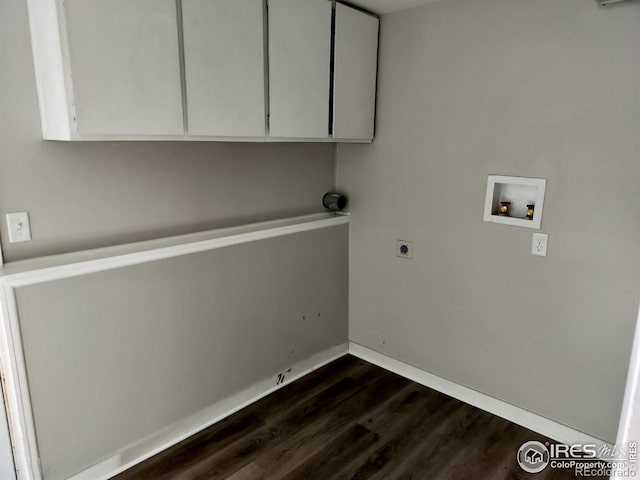 laundry area with dark wood-style flooring, washer hookup, baseboards, cabinet space, and electric dryer hookup