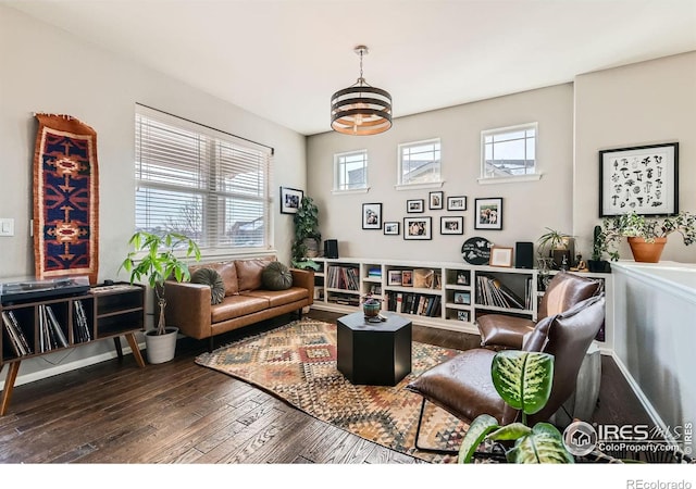 living room featuring dark wood-style flooring