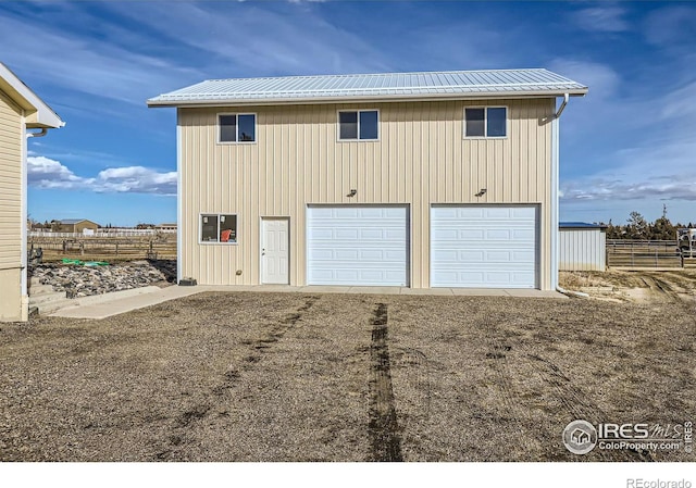 garage with fence