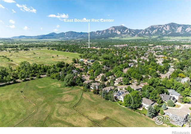 birds eye view of property featuring a mountain view