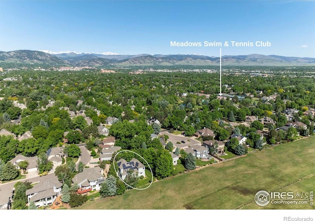 drone / aerial view with a residential view and a mountain view