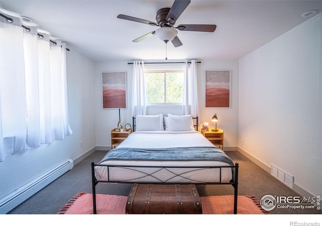 bedroom with visible vents, baseboards, a ceiling fan, a baseboard radiator, and carpet