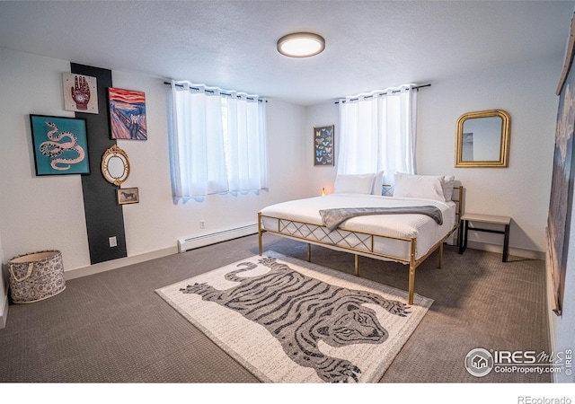 bedroom with a baseboard radiator, baseboards, a textured ceiling, and dark colored carpet