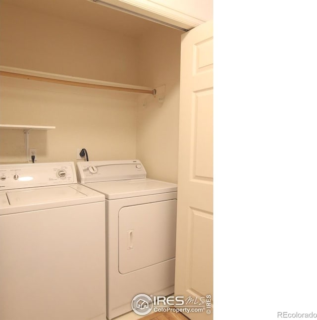 laundry area featuring laundry area and washing machine and dryer