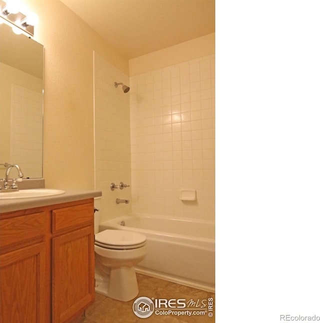 bathroom with toilet, shower / bath combination, tile patterned flooring, and vanity