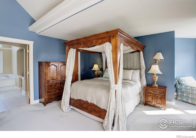 bedroom featuring light carpet and baseboards