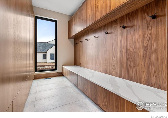 mudroom featuring light tile patterned floors