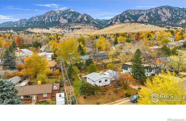 bird's eye view featuring a residential view and a mountain view