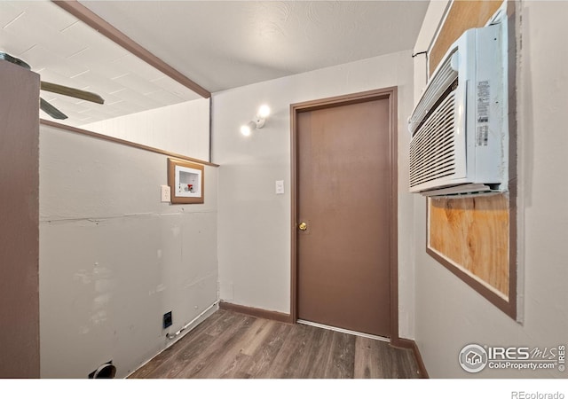 doorway with wood finished floors