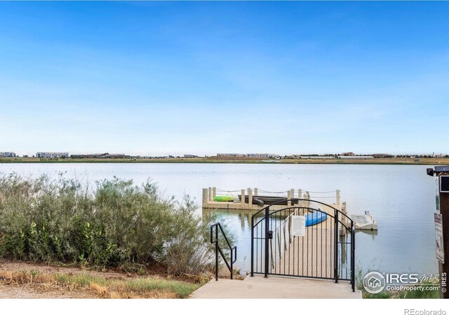 view of dock with a water view