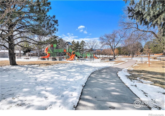 snow covered playground featuring playground community