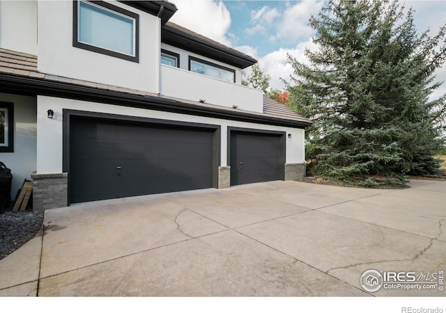 garage featuring driveway