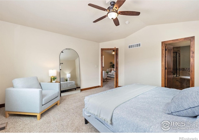 bedroom with carpet floors, visible vents, vaulted ceiling, ceiling fan, and baseboards