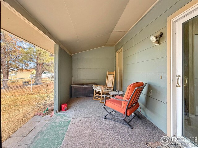 view of patio featuring fence