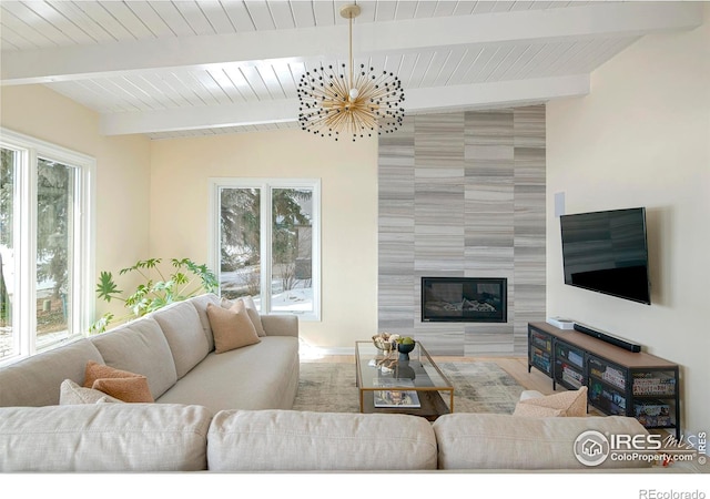 7034 Indian Peaks Trl, Boulder, CO 80301 - living room featuring an accent wall, a fireplace, and baseboards