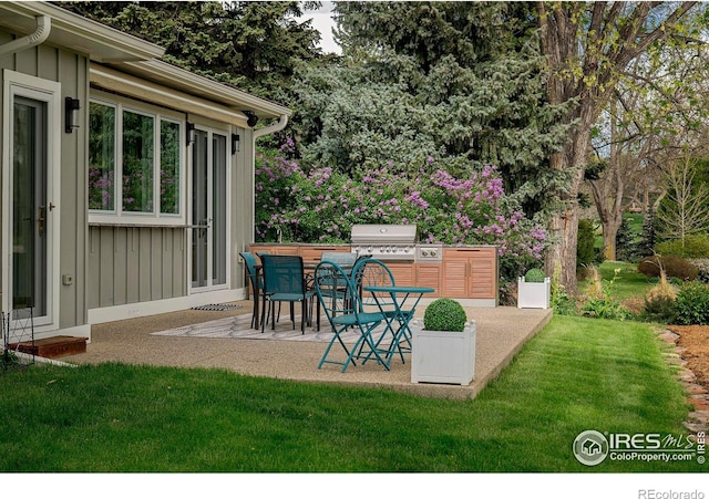 7034 Indian Peaks Trl, Boulder, CO 80301 - view of patio / terrace with grilling area and outdoor dining space