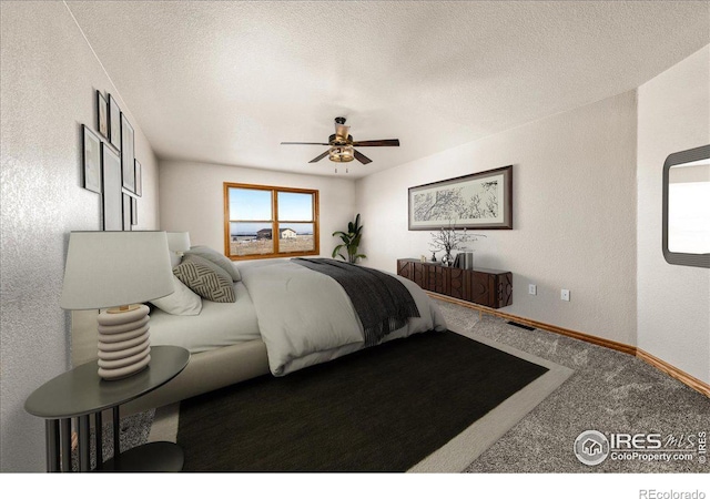 11837 County Road 39, Fort Lupton, CO 80621 - bedroom featuring a textured ceiling, carpet flooring, baseboards, and a textured wall