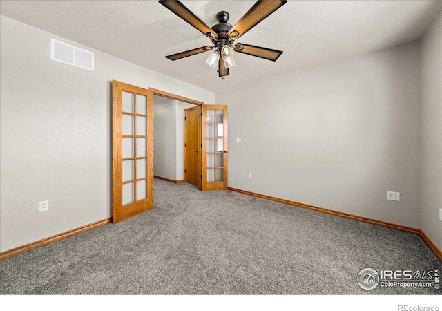 11837 County Road 39, Fort Lupton, CO 80621 - carpeted spare room with a textured ceiling, a ceiling fan, visible vents, french doors, and baseboards