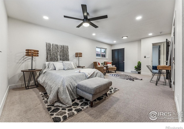 bedroom featuring a closet, carpet, and recessed lighting