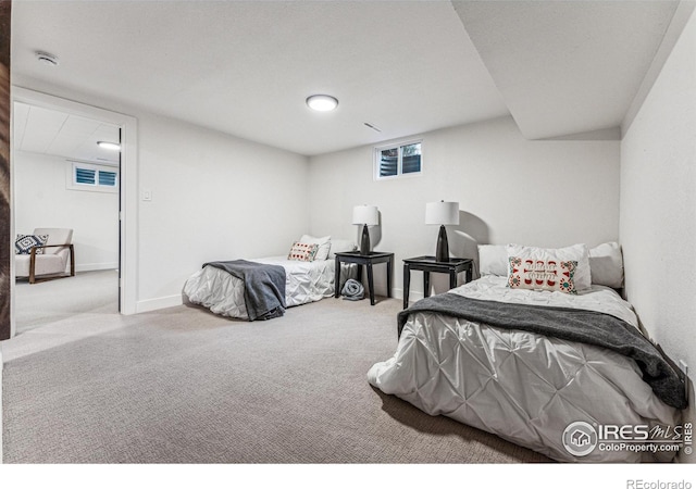 bedroom featuring carpet, visible vents, and baseboards